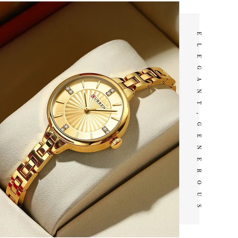 Curren 9097 Gold women’s watch featuring a slim round dial and stainless steel band, presented by Zuri Blooms