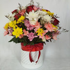 Eternal Embrace flower box featuring mixed flowers in a luxury round box, arranged by Zuri Blooms