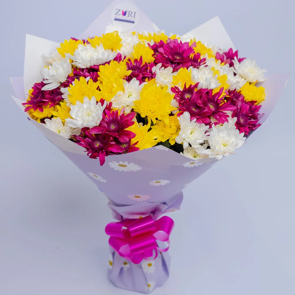 Luminous Bliss bouquet featuring yellow, white, and purple chrysanthemums Classic, arranged by Zuri Blooms