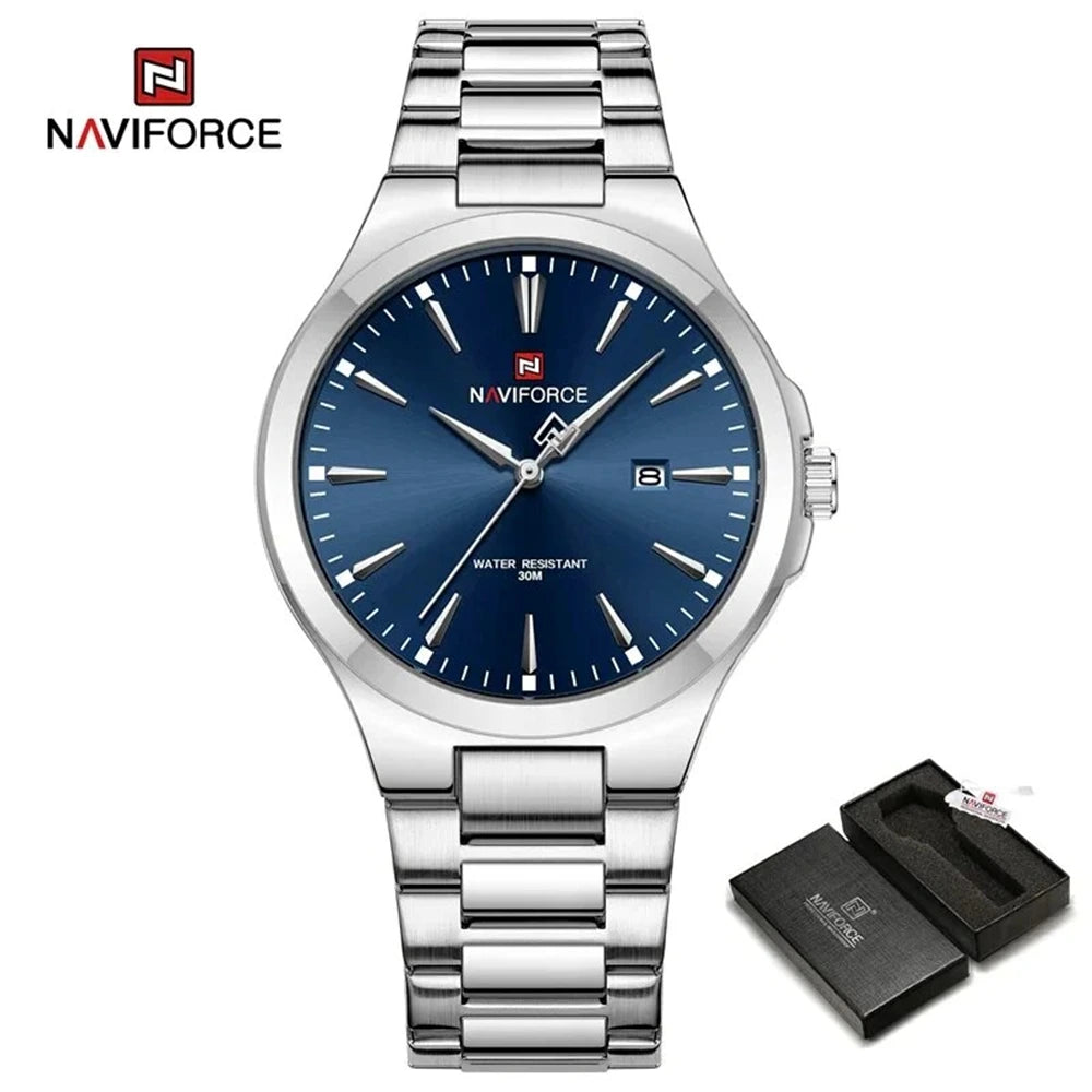 NF9214 Silver and Blue men’s quartz watch featuring a round dial and stainless steel band, presented by Zuri Blooms