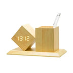 Pen holder with digital clock displaying time, date, and temperature, angled presented by Zuri Blooms