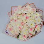 Pink and White Harmony bouquet featuring pink roses and white chrysanthemums front, arranged by Zuri Blooms
