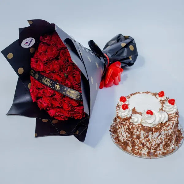 Red roses bouquet with birthday cake gift bundle, arranged by Zuri Blooms