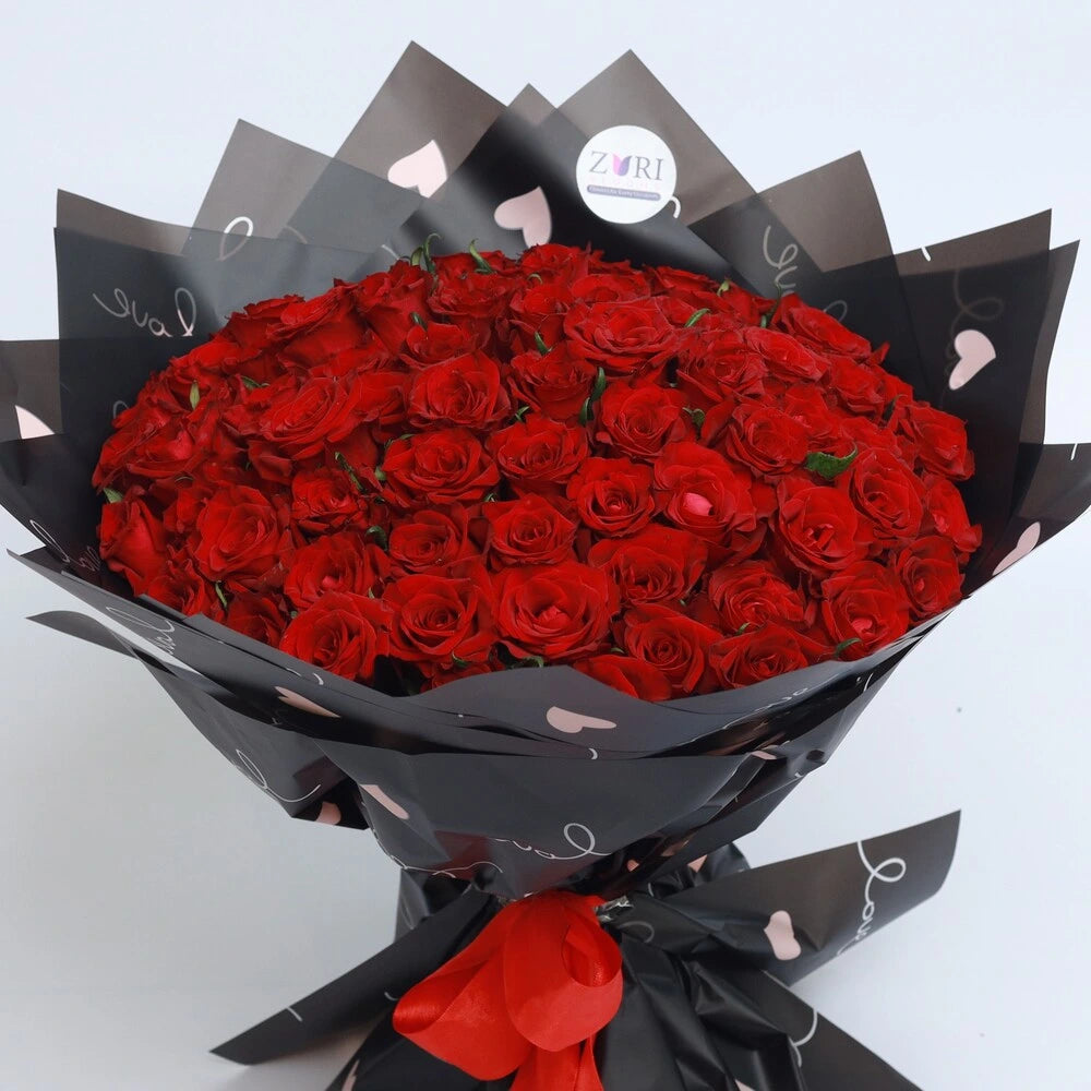 Passionate Red bouquet featuring premium long-stemmed red roses, arranged by Zuri Blooms