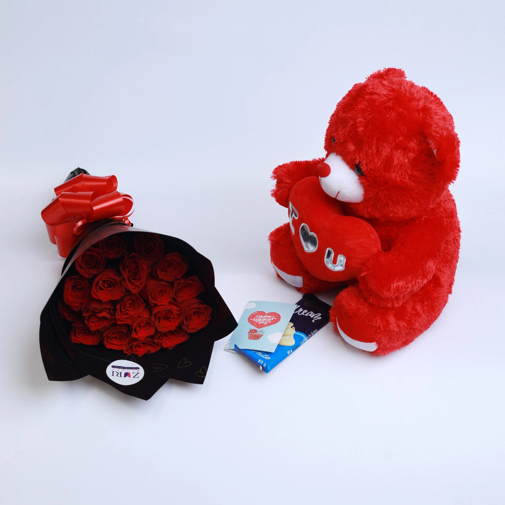 Red roses bouquet with teddy bear and Cadbury chocolates, arranged by Zuri Blooms