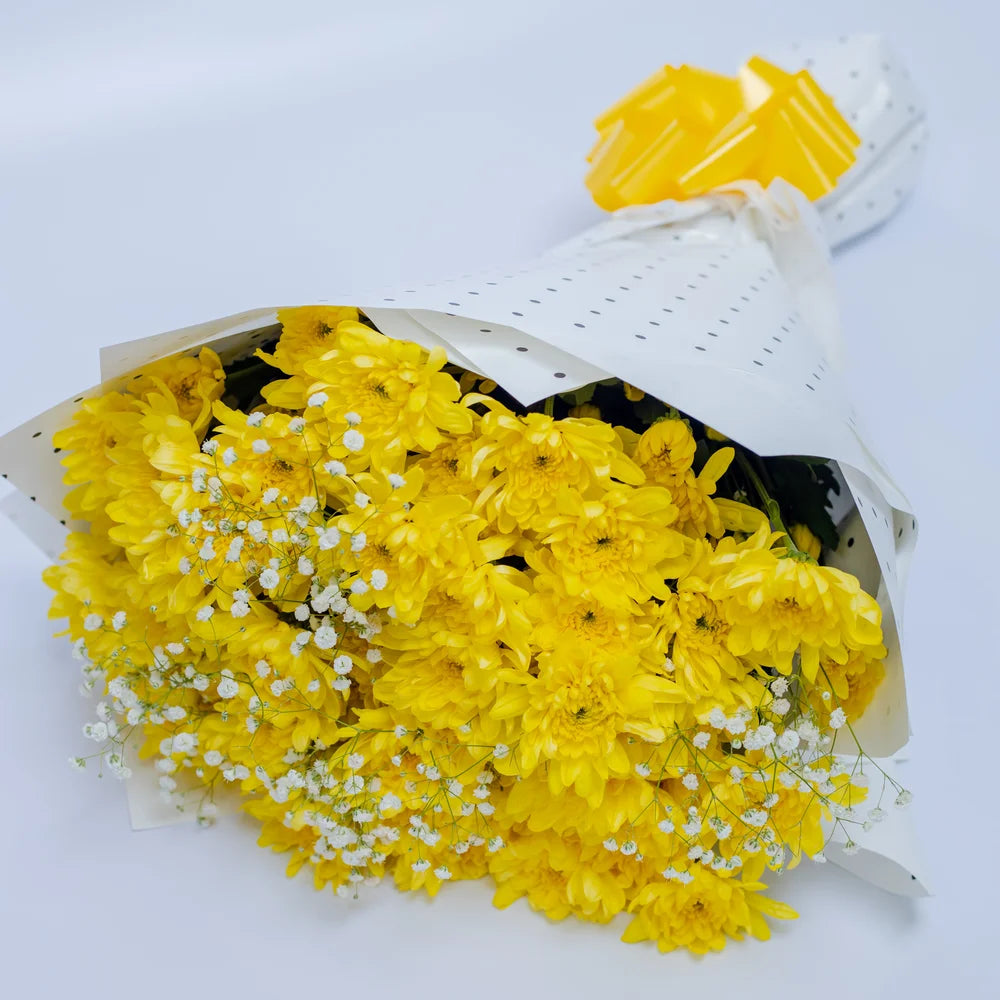 Summer Bliss bouquet featuring yellow mums and white gypsophila side, arranged by Zuri Blooms