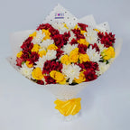 Sunset Serenade bouquet featuring yellow roses with red and white chrysanthemums, arranged by Zuri Blooms