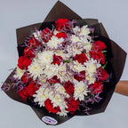 Timeless Elegance bouquet featuring red roses, white chrysanthemums, and purple limonium front, arranged by Zuri Blooms