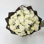White Ensemble bouquet with white roses, white chrysanthemums, and white gypsophila arranged by Zuri Blooms Nairobi